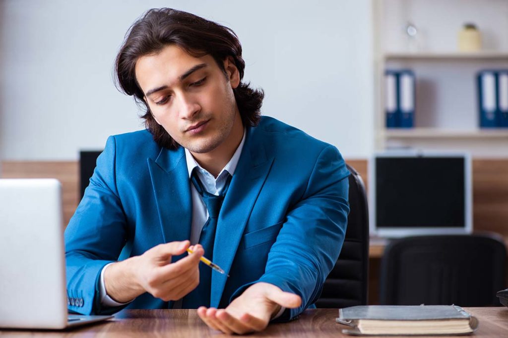 young man about to succumb to the risk of future professionals and drug addiction